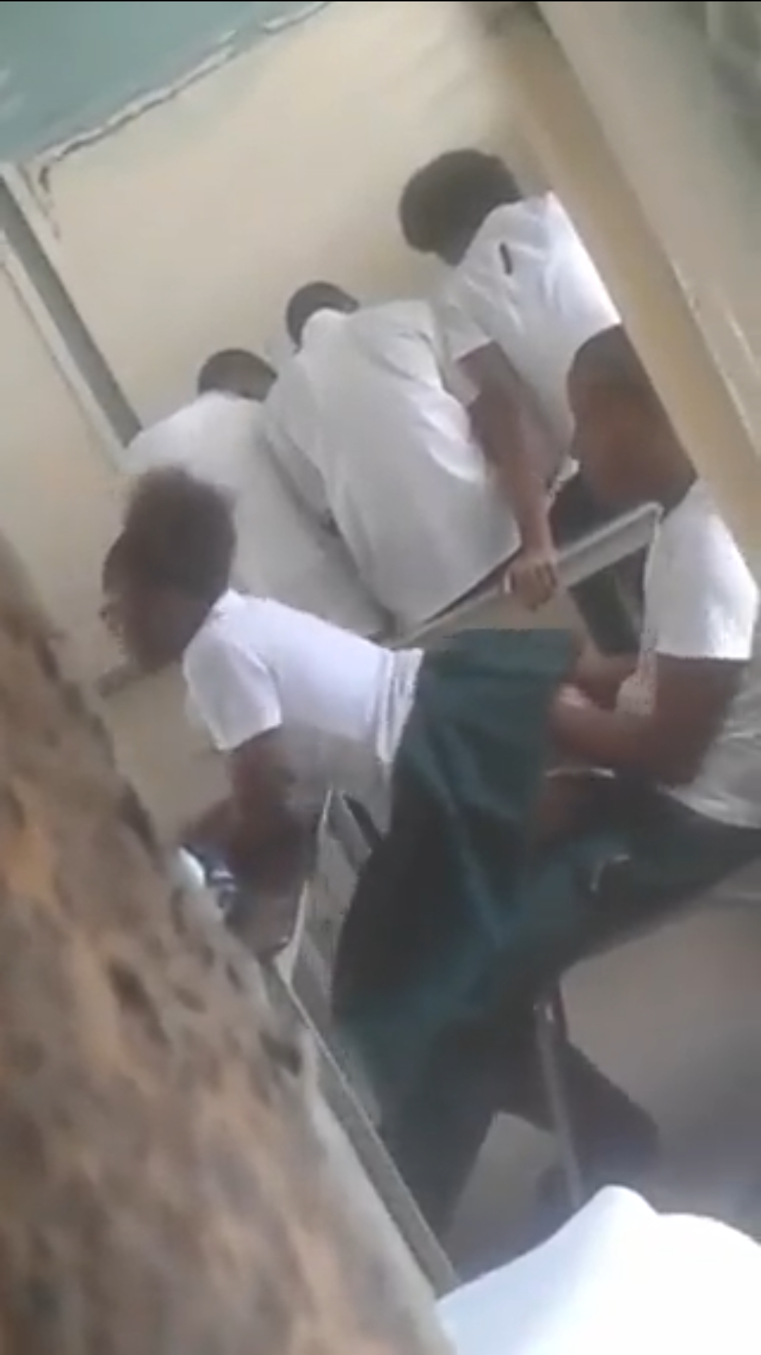 SS2 student sitting on her class mate Dick while lectures was going on